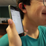 cosinuss° STEM project Menorca student with sensor and smartphone