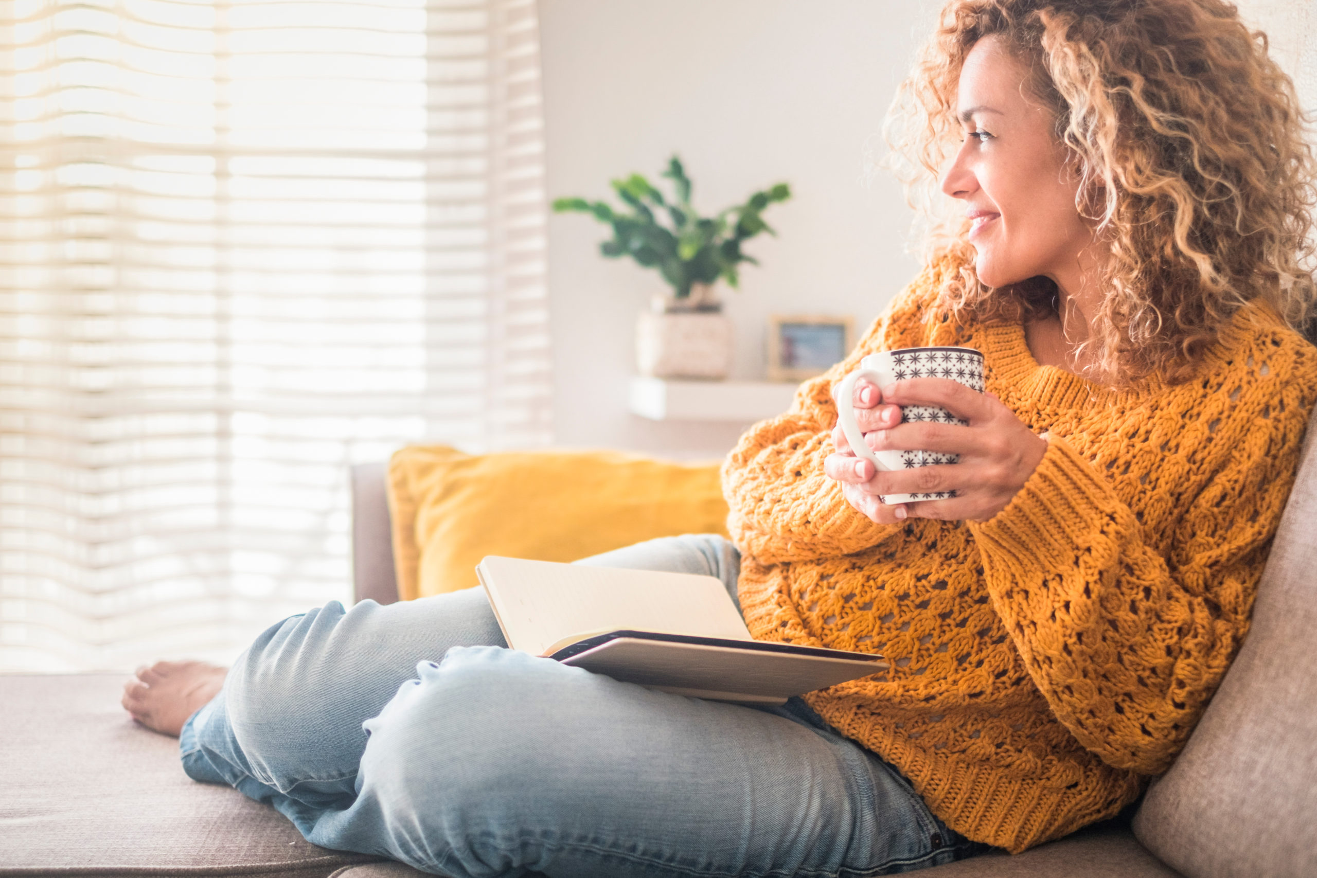 relaxed woman at home with coffee