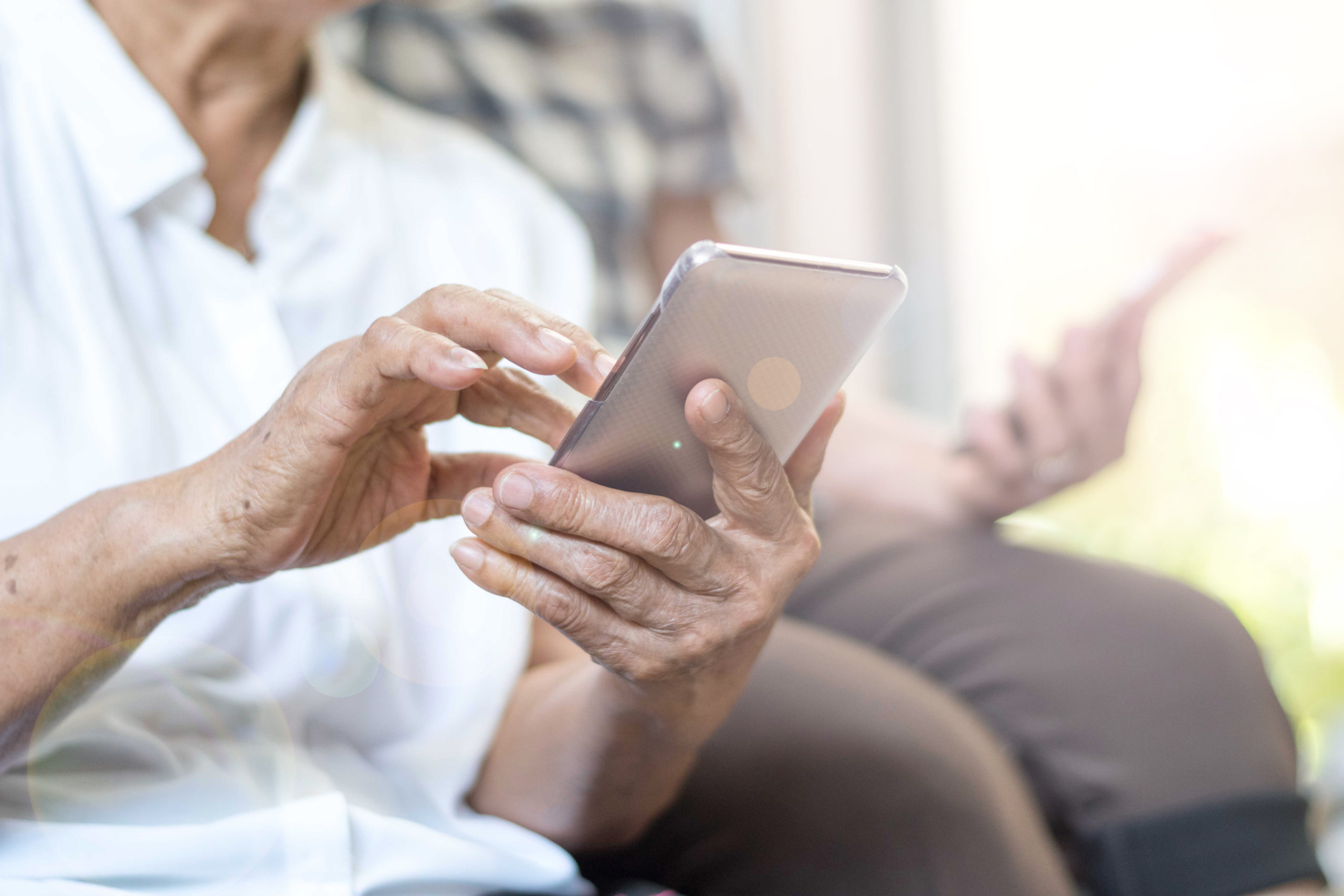 elderly people using smartphones